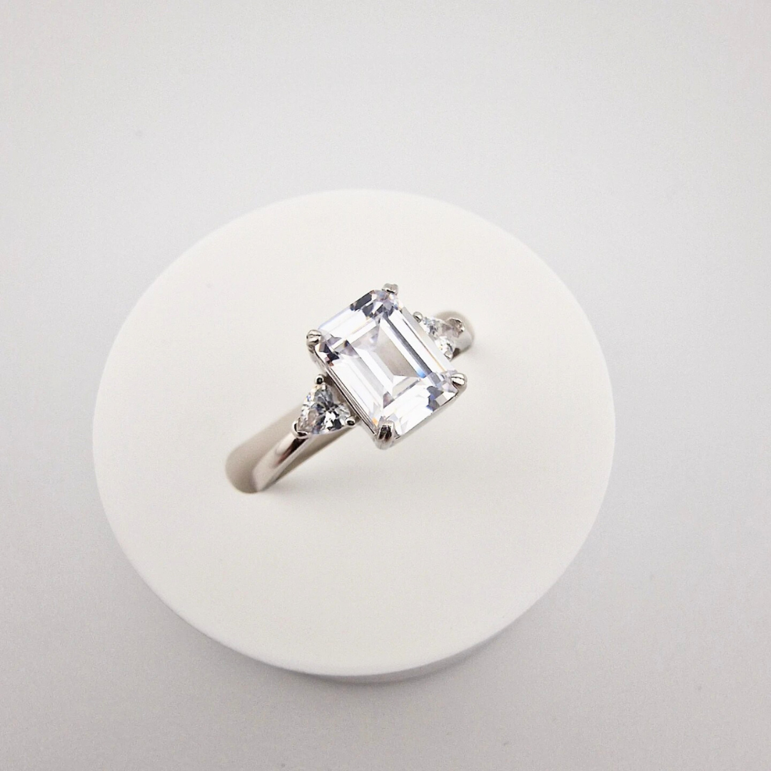 925 Sterling Silver 2ct Emerald Cut with Side Hearts Cz Ring