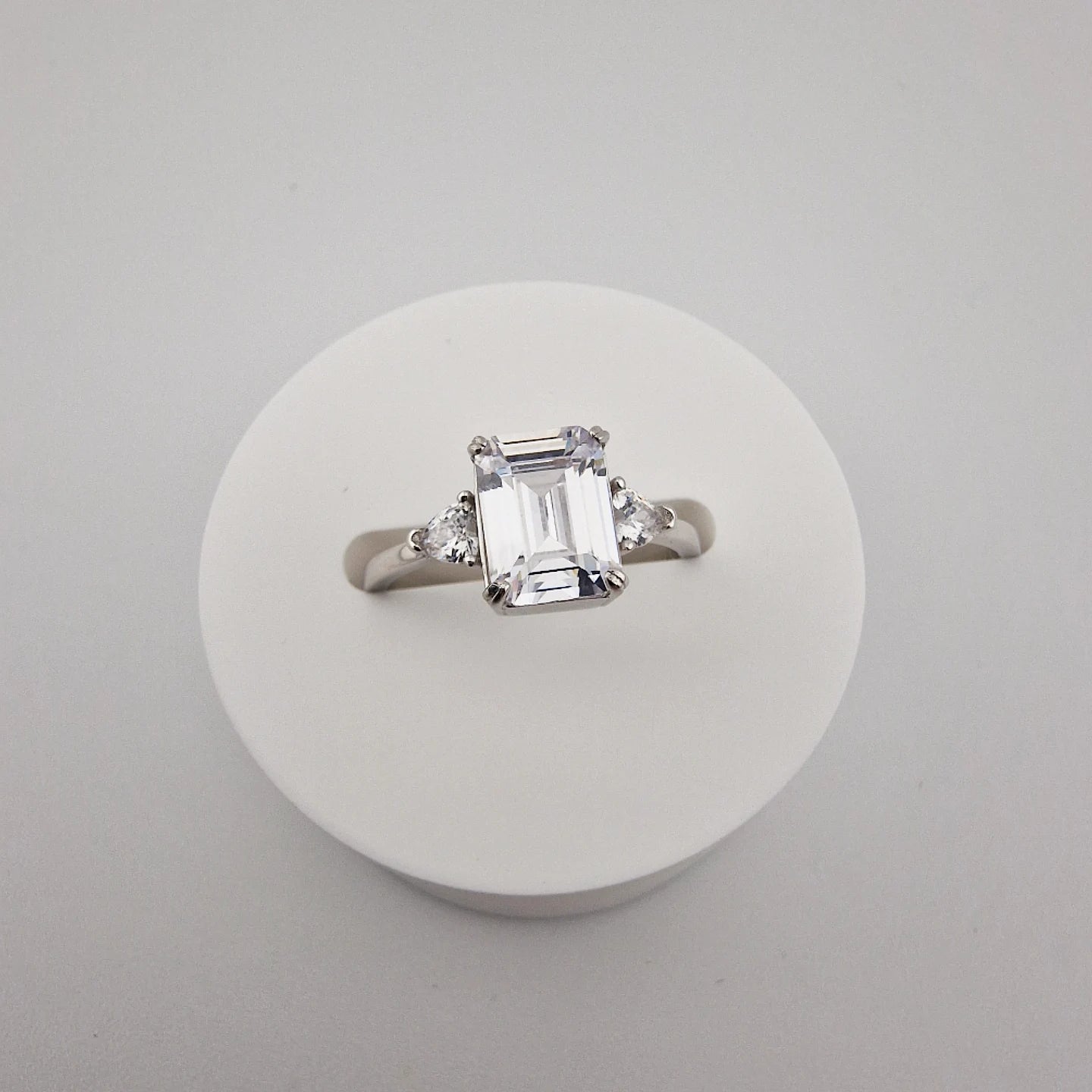 925 Sterling Silver 2ct Emerald Cut with Side Hearts Cz Ring